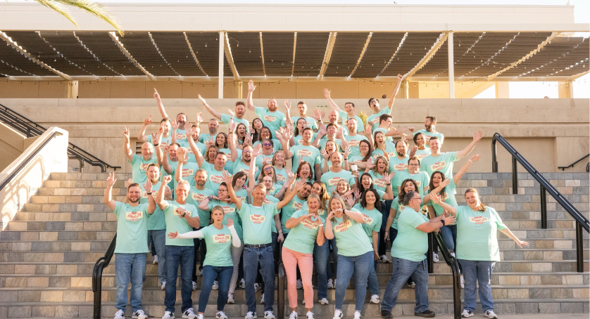 London Computer System employees posing outside Palm Springs at RMUC.24.