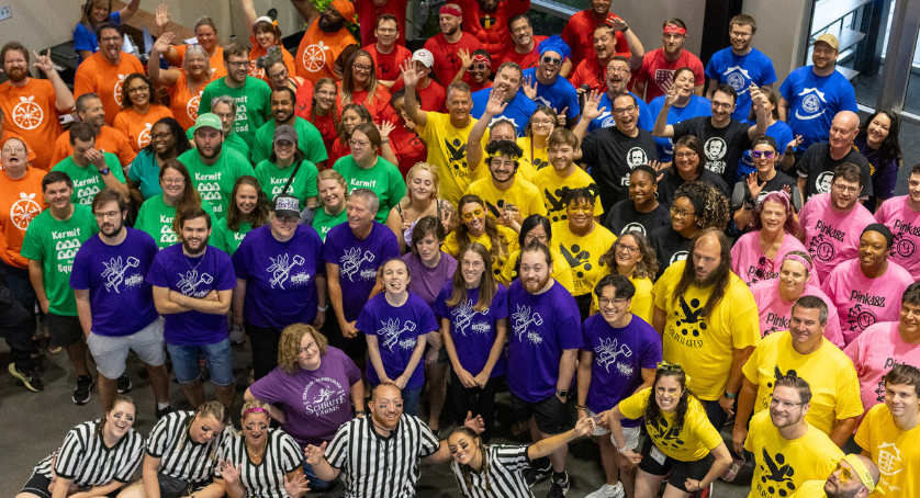 LCS employees smiling at the annual LCS Olympics. 