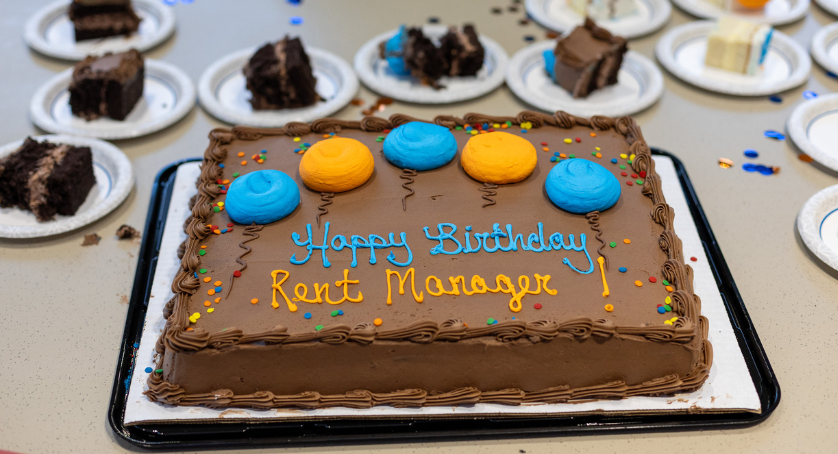 A birthday cake that reads 'Happy birthday Rent Manager".